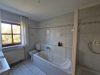 Charmante Doppelhaushälfte mit großzügigem Garten in Gräfelfing! - Bad mit Wanne und Dusche