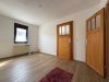 "2-in-1 Immobilienpaket in Weisel: Ideal für Kapitalanleger oder Mehrgenerationen" - Schlafzimmer EG - Fachwerkhaus