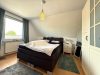 "Mehr Raum. Mehr Möglichkeiten. Mehrfamilienhaus in Eppenrod mit Potenzial!" - Schlafzimmer im DG
